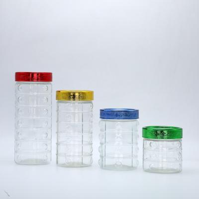 China 4 Piece Sustainable Vintage Large Clear Glass Storage Jars With Lid Colored Plastic Glass Food Storage Canisters for sale