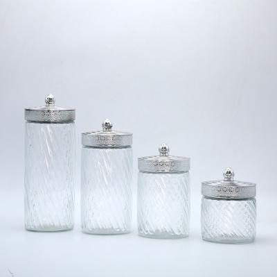 China 4 Piece Sustainable Vintage Clear Glass Storage Jars With Screw Lid Silver Plastic Food Grade Glass Canisters for sale