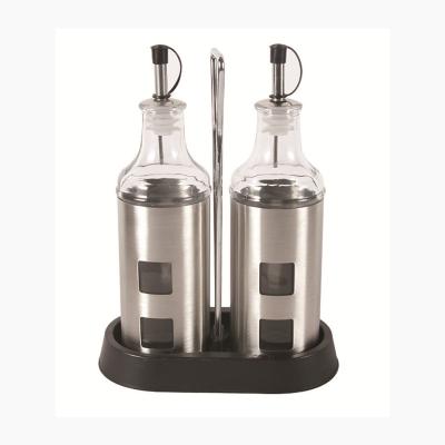 China Viable Set 2 Stainless Steel Oil Vinegar Coated Glass Bottles In Plastic Holder Glass Spice Shakers for sale