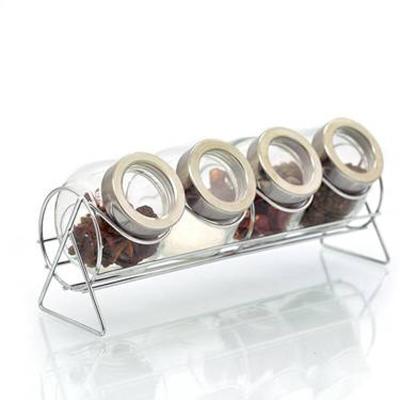 China Viable Set 4 Clear Glass Metal Spice Jars Rack Spice Storage Jars for sale