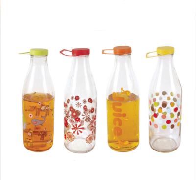 China Freshness Preservation 500ml Beverage Glass Bottle With Plastic Screw Lids Customized Design for sale