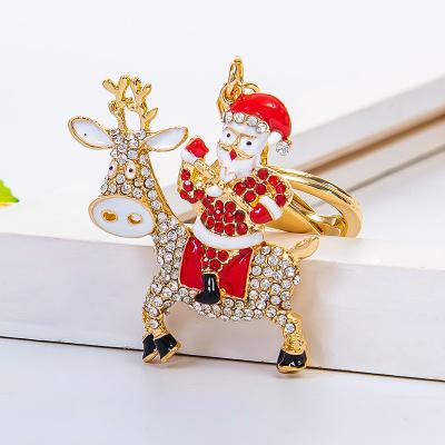 China Simple and handsome Christmas keychain fine Santa Claus Metal hot fine bag charm Decorative pendant small gift keychain for sale