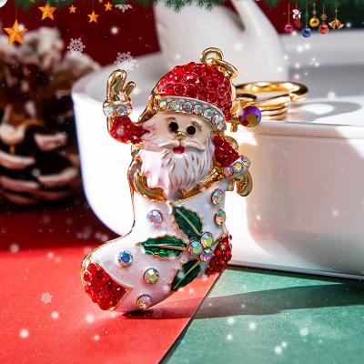 China Simple and handsome Christmas keychain fine Santa Claus Metal hot fine bag charm Decorative pendant small gift keychain for sale