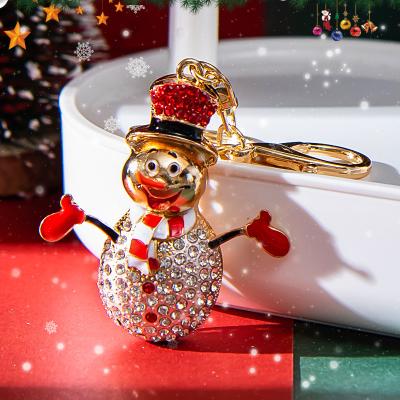 China Simple and handsome Christmas keychain fine Christmas snowman Metal hot fine bag charm Decorative pendant small gift keychain for sale