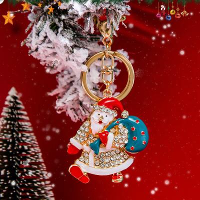 China Simple and handsome Christmas keychain fine Santa Claus Metal hot fine bag charm Decorative pendant small gift keychain for sale