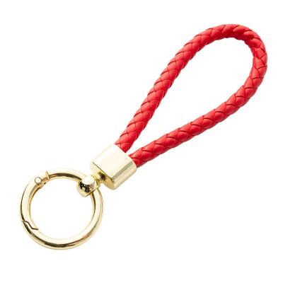 China Simple Leather car keychain PU braided rope car key charm Simple light luxury men and women car keychain for sale