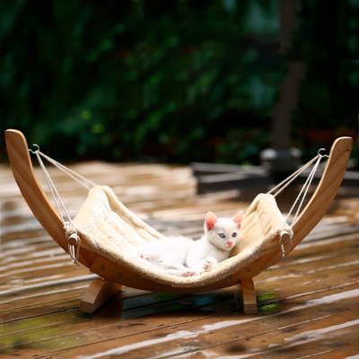 China New Plush Fabrics Leopard Hammock Small Dog Cat Hammock Swing Bed Breathable Reversible Wooden Pet Bed for sale