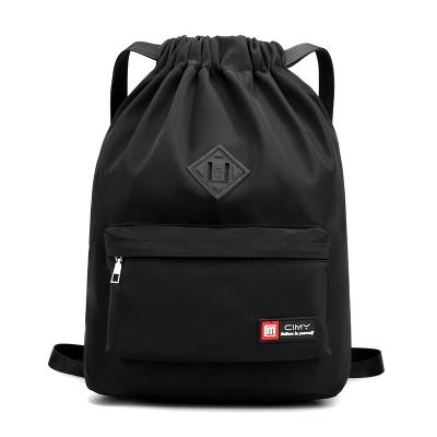 China Custom Small Drawstring Folding Bag Travel Waterproof Foldable Laptop Backpack Teenage School Backpacks for sale