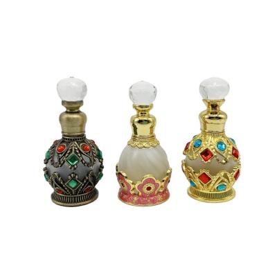 China 15ml Popular Antiqued Unique Metal Alloy Perfume Bottle Essential Oil Bottle Glass Stick Dropper for sale