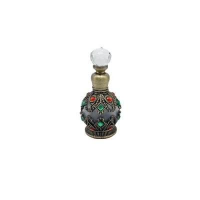 China 15ml Popular Antiqued Unique Metal Alloy Perfume Bottle Essential Oil Bottle Glass Stick Dropper for sale