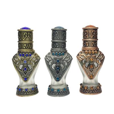 China Middle Eastern metal bottle Arabian aromatherapy oil glass bottle ladies perfume glass stick for sale