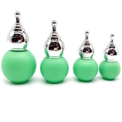 China Colored gourd bottle/empty glass bottle/round glass bottle with round screw cap 15ml/30ml/50ml for sale