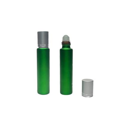 China 10ml15ml green rotating gold cap ball bearing essential oil medicine oil care solution glass bottle for sale