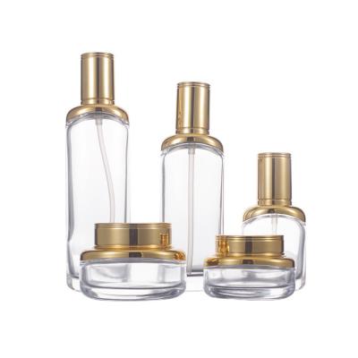 China Luxury Rose Gold Cosmetic Packages Glass Skincare Containers Bottle and Jar Pump Cap Cosmetic Packing Standard Availvlable 124 for sale