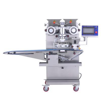 China High efficiency automatic mochi encrusting process making machine/encrusting filled cake making machine/maamoul making machine for sale