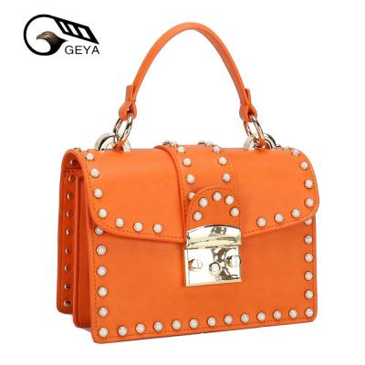 China Lady fashion pearl rivet design custom cross - body bag for lady woman genuine leather shoulder bag for sale