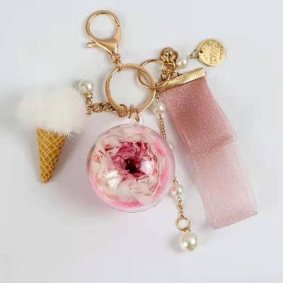 China Wholesale Luxury Multi Size Self Defense High End Natural Rose Key Chain Preserved Flower Key Chain For Gift Craft Or Valentines Gift for sale