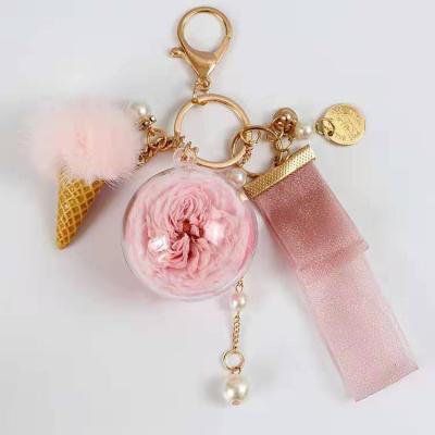 China 2019 Luxury Self Defense Key Chain High Quality Sweet 5cm ODM Preserved Flower Key Chain For Valentines Gift for sale