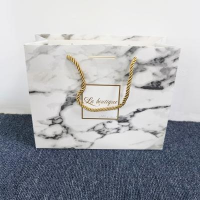 China Recyclable Custom Logo Luxury Boutique Shopping White Gift Paper Bag Brand Handle Bags for sale