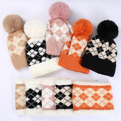 China 2023 fashion design wholesale new winter knitted acrylic hat hat and scarf suits warm color matching liner for sale