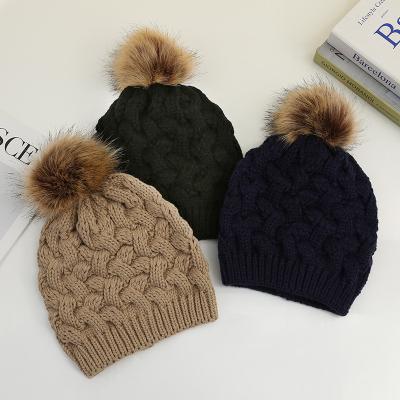 China Casual Classic Hats Custom Made 100% Acrylic Warm Winter Knitted Beanie Hats With Pom Pom for sale