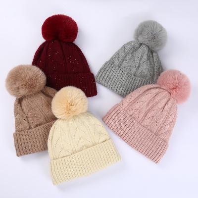 China Fashion Beanie Pom Pom Hats Embroidery Custom Logo Custom Made 100% Cotton Winter Knitted Beanie Hats for sale