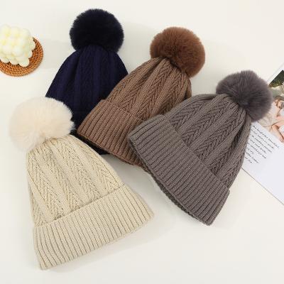 China Custom Logo Casual Winter Women Soft Acrylic Beanie Caps Hat With Faux Fur Wholesale for sale