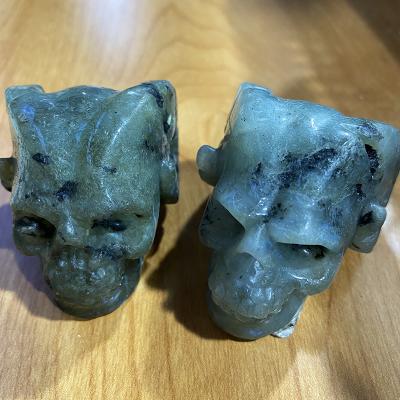 China Wholesale Natural China Decoration Crystal Stone Hand Carved Healing Crystal Skulls With Cleat For for sale