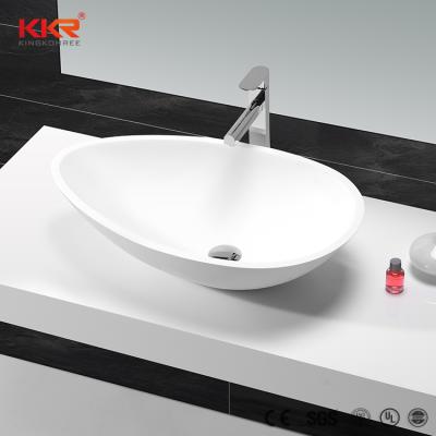 China Polished KKR Small Sizes Above Countertops Design Solid Exterior Stone Oval Bathroom Basin for sale