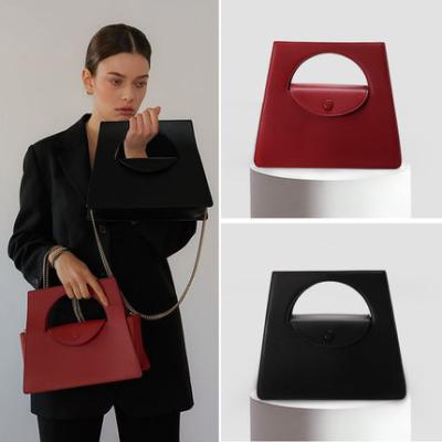 China 100% Eco-friendly Famous Design Trapezoid Shape Handbag Leather Double Fasten Magnetic Buckle For Schultertasche Bags for sale