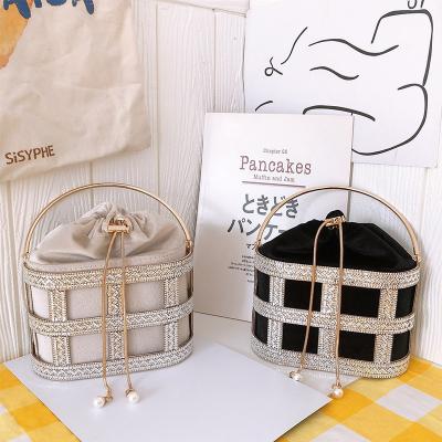 China 100% Eco-friendly Shiny Metal Birdcage Purse Evening Clutch Bags Grab Bags With Crystal Badies for sale