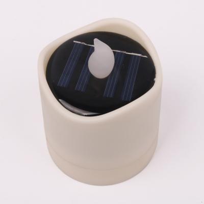 China SOL1219F LED Solar Waterproof Tea Light Yellow Flickering Candle for Home Decor for sale