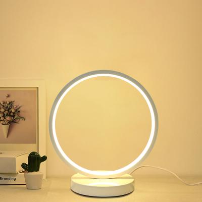 China Simple Modern Bedside Wall Light Modern Metal Acrylic Reading Eye Protection Table Lamp Style LED O Type Decorative Lighting for sale