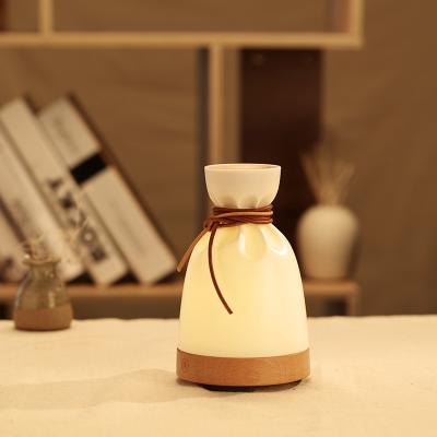 China Feel Sell Wood Cozy Top Grain Cool Mist Humidifier With Reduce Noise Bag Shaped Aroma Essential Oil Diffuser For Home Office for sale