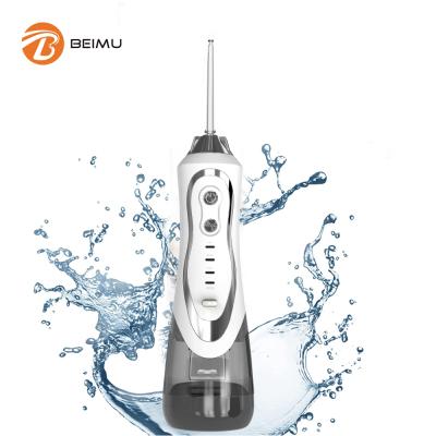 China 2021 Portable White Cheap Dental Oral Private Tooth Irrigator 310Ml Water Flosser Teeth Clean Remover for sale