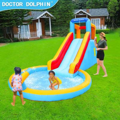 China 420D+840D FVC Fabric Doctor Dolphin New Hot Child Entertainment Inflatable Jumping Castle Bouncy Bounce House With Gun And Water Slide for sale