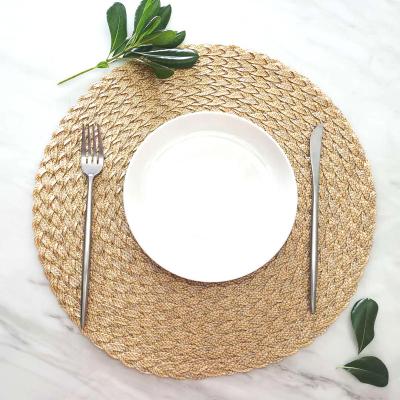 China Sustainable Eco Friendly Natural Round Handwoven Place Mats Braided Straw Placemats Plate Placemat Set of 4 for sale