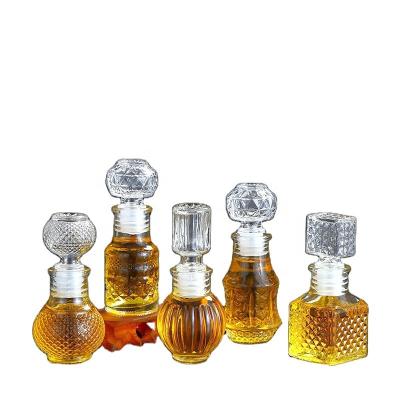 China Luxury Glass Beverage 50ml Capacity 2oz Small Wine Storage Bottles for sale