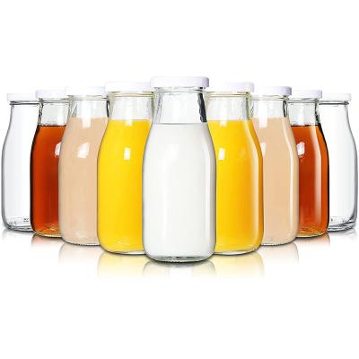 China Beverage 200/250ml Glass Milk Bottles With Reusable Metal Twist Lids For Beverage Glassware for sale