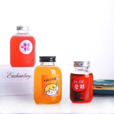 China Creative Simple Drink Pangpang Design Juice Glass Milk Tea Empty Glass Bottle Instagram Coffee Mugs Lovely for sale