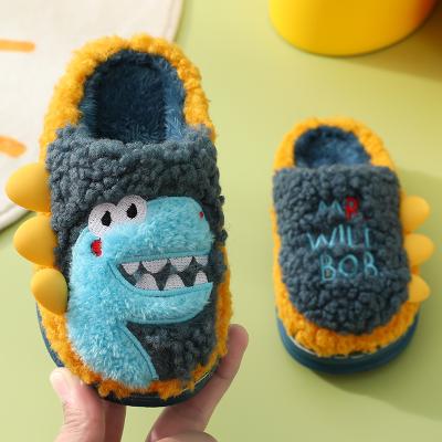 China Wholesale Cute Plush Thermal Cute Dinosaur Printed Slippers Winter Kid Boys Cotton Non-Slip Home Slippers for sale