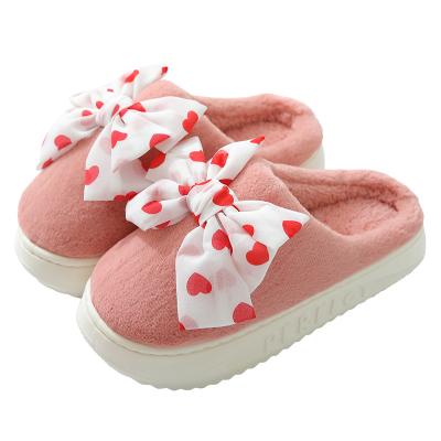 China 2022 Fashionable Plush Indoor Slippers Plush Slides New Winter Bow Slippers Warm Home Ladies Bedroom Cushioning for sale