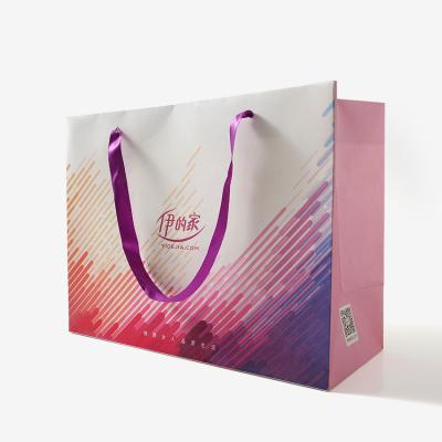 China Custom Wholesale Custom Handmade Logo Apparel Shopping Bag Packaging Gift Cheap Color Printed Paper Bag With Rope Ribbon Handle for sale