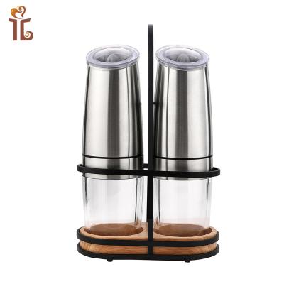 China New Design Fashionable Gravity Pepper Mill Battery Operated Electric Salt and Pepper Mill SET with Stand Blue LED Light for sale