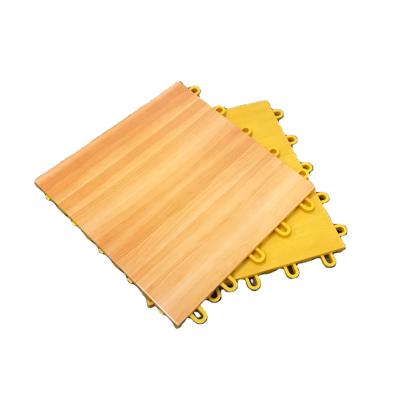 China Modern Maple Wood Basketball Court Pattern For Indoor Tennis Use PP Interlock Mat for sale