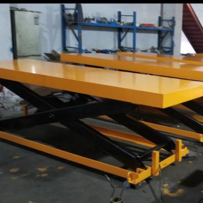 China 2000kgs workshop use scissor cargo lift for warehouse and workshop for sale