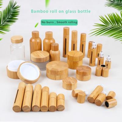 China Personal care 2021 the hottest 10ml 15ml perfume glass bamboo wooden bottle for sale