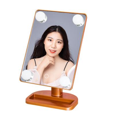 China 2020 New Design 4 Large Bulbs Lighted Desk Mirror With Lights Sensor Switch Makeup Mirror With Adjustable Brightness for sale