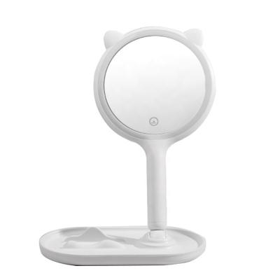 China Lighted Makeup Mirror Professional Mirror With Handheld And 360 Degree Rotation Smart Hand Girl Mirror for sale