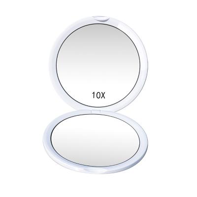 China Hot Sale Pocket Magnifying Mirror With Flat And Portable Round 10X Magnification Small Travel Mirror Folding Magnifying Mirror for sale